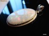 pandantiv medalion aur 14K cu Opal Natural Certificat 13.36 ct.