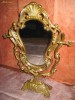 Superba oglinda mare de dama in stil Baroc in bronz aurit