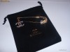 Brosa CHANEL Aurie cu pietricele. Replica. Cadou: saculet CHANEL negru!