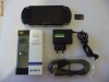 Sony PSP 3004 MODAT full accesorii card 4gb cu filme muzica + casti Sony + cablu  + incaractor original