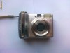 Canon A 560 impecabil + card 1 giga + acumulatori + charger