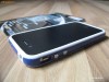 Bumper Iphone 4 / 4S Cu butoane Metalice Extra Calitate Alb Cu Albastru      + Cadou Folie Fata Spate ( Screen Protector and Back )