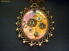 Colier steampunk  (lant lung) (realizat din piese de ceas prinse in rasina), culori: bronz, roz, violet, auriu (pastelate) Unicat