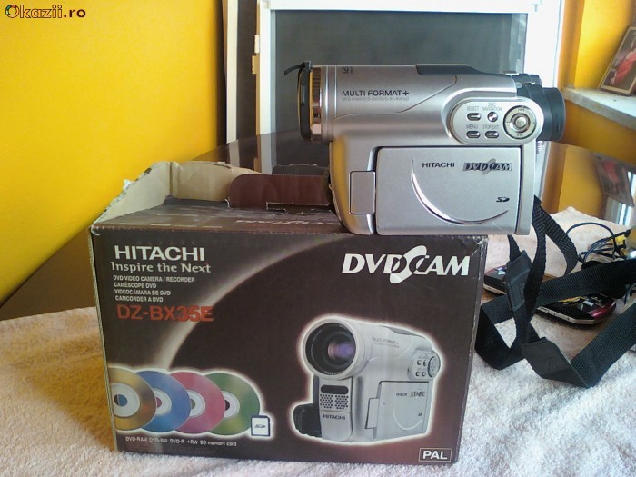 VAND SAU SCHIMB  .CAMERA HITACHI MINI DVD foto mare